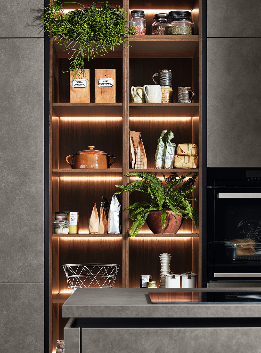 Luxury German kitchen with illuminated open shelving